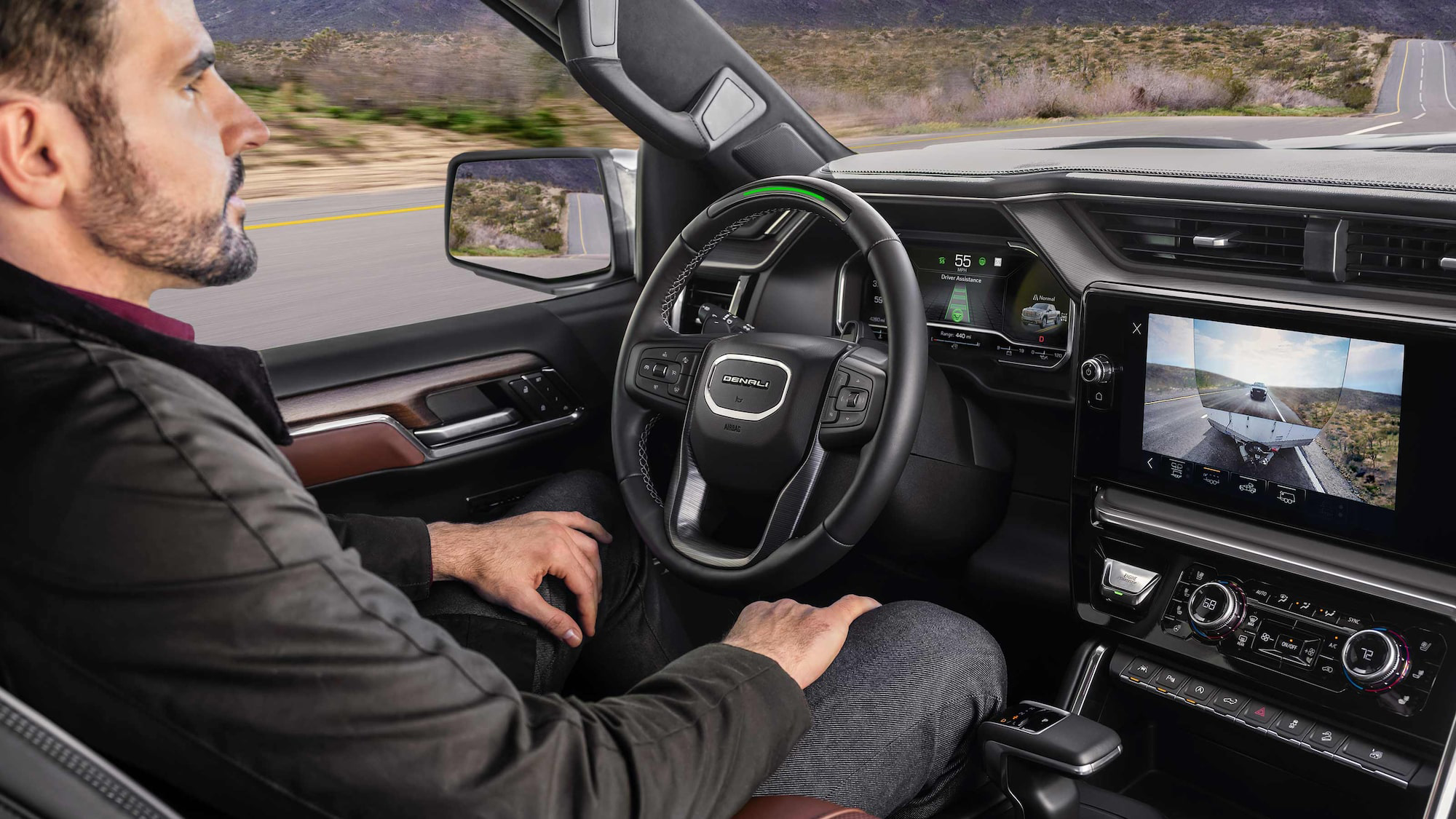 Driver using GMC Super Cruise for hands free driving