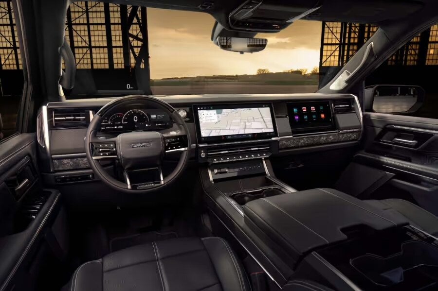 2027 GMC Sierra 1500 Denali Ultimate interior with 16.3-inch touchscreen and driver display