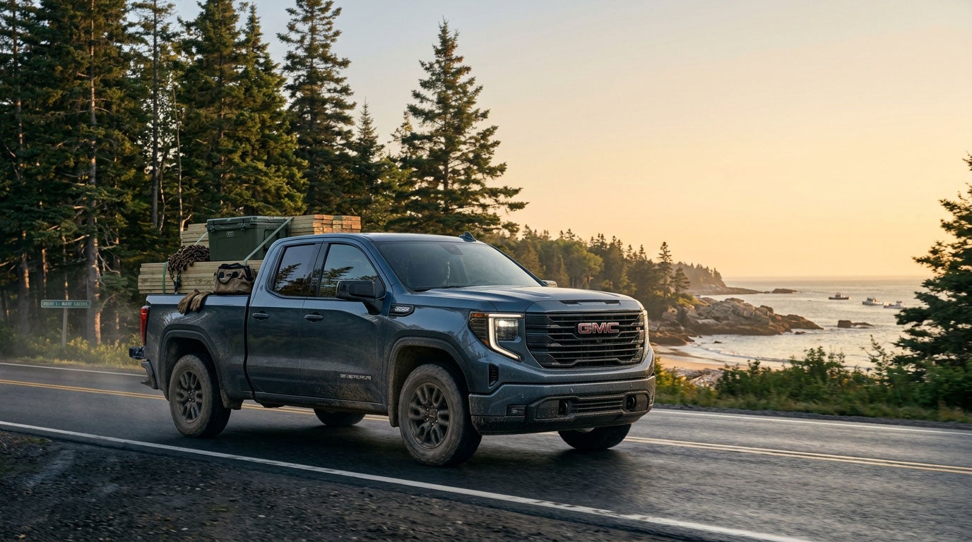 GMC Sierra 1500 Double Cab with a longer bed on a Southern Maine road