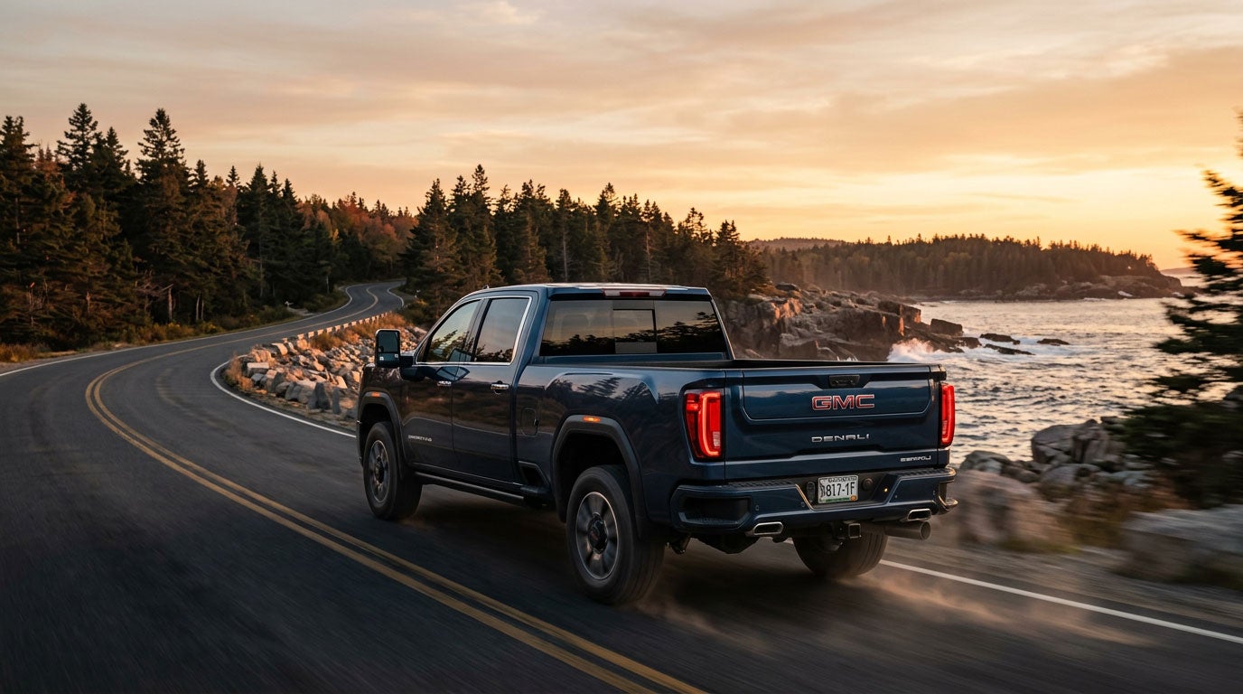 GMC Sierra on a Southern Maine road at golden hour