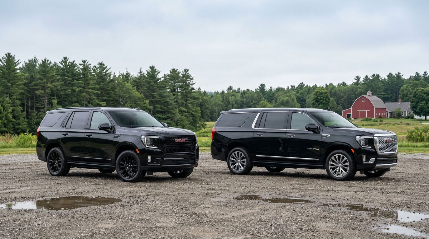 GMC Yukon and longer Yukon XL parked side by side in Southern Maine